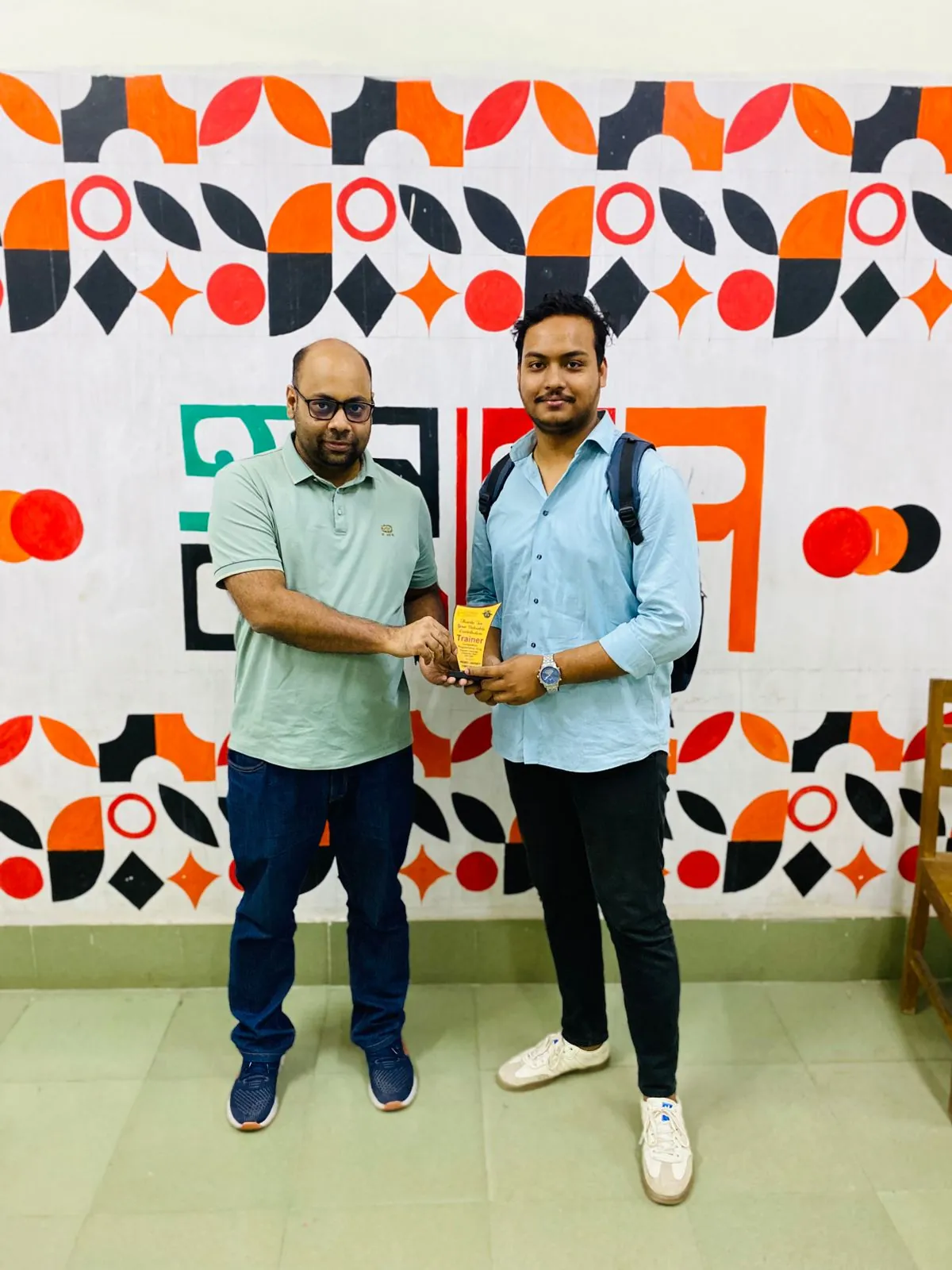 Competitive Programming Trainer — receiving award from Kingshuk Dhar